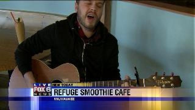 Laura enjoys music on Refuge Smootie Cafe