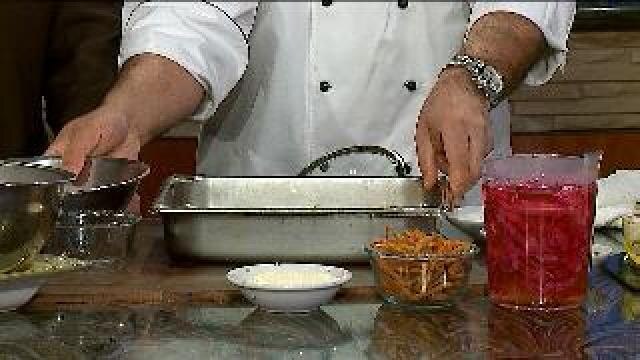 Chef Feker prepares roasted vegetable salad with pickled cabbage