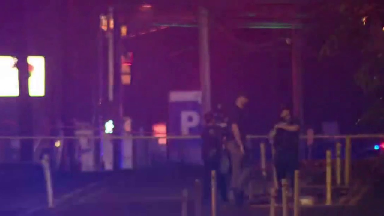 Multiple people show outside BBQ restaurant