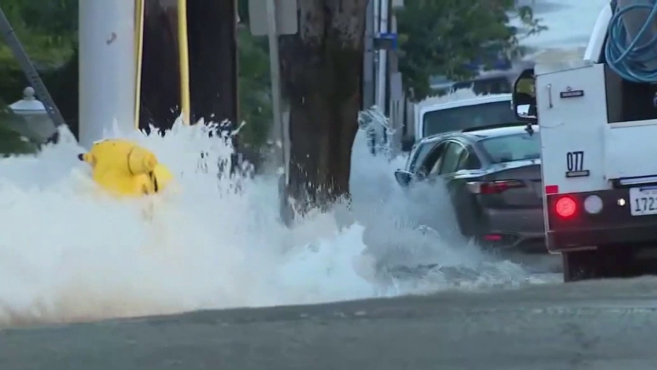 Sinkhole opens after water main break, flooding in WeHo