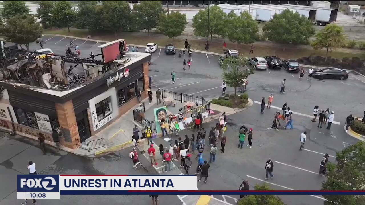 Demonstrators gather at Atlanta Wendy's where officer killed Rayshard Brooks
