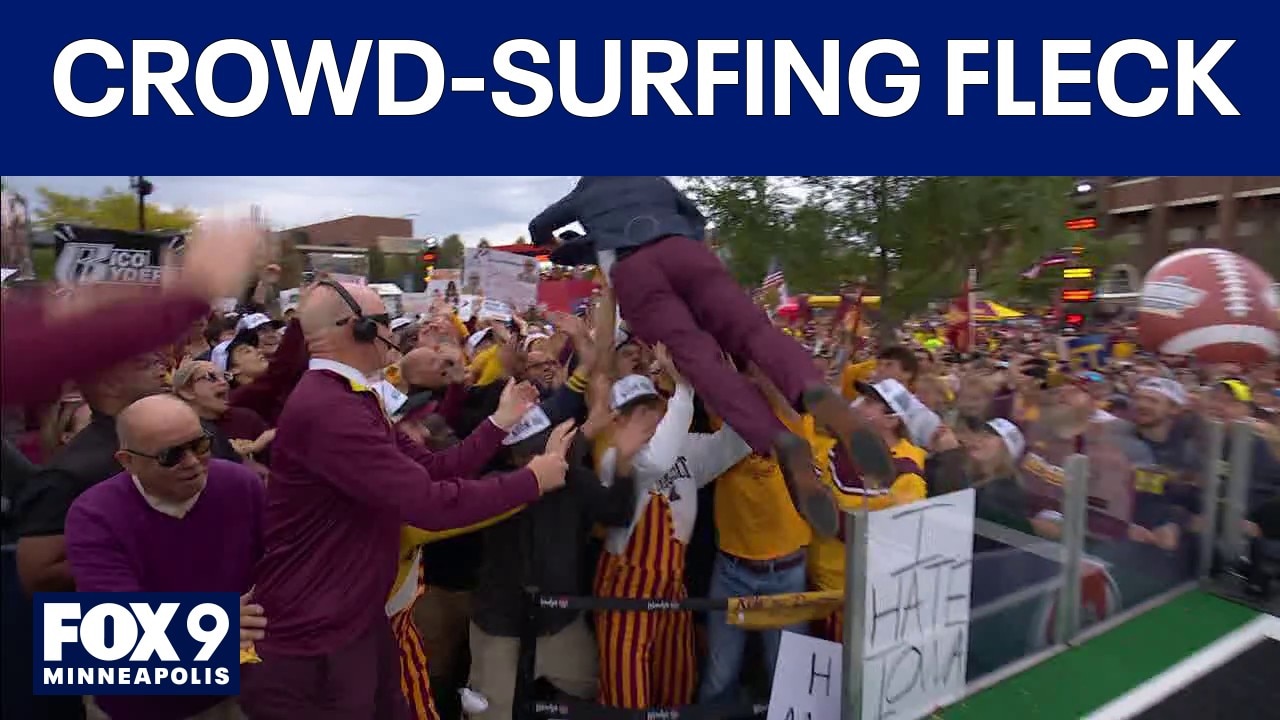 Gophers' P.J. Fleck goes crowd surfing at Big Noon Kickoff set