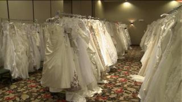 Laura checks out gowns for Brides Against Breast Cancer