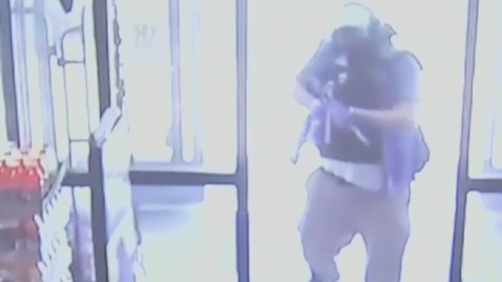 Gunman kills three, himself in racially motivated shooting