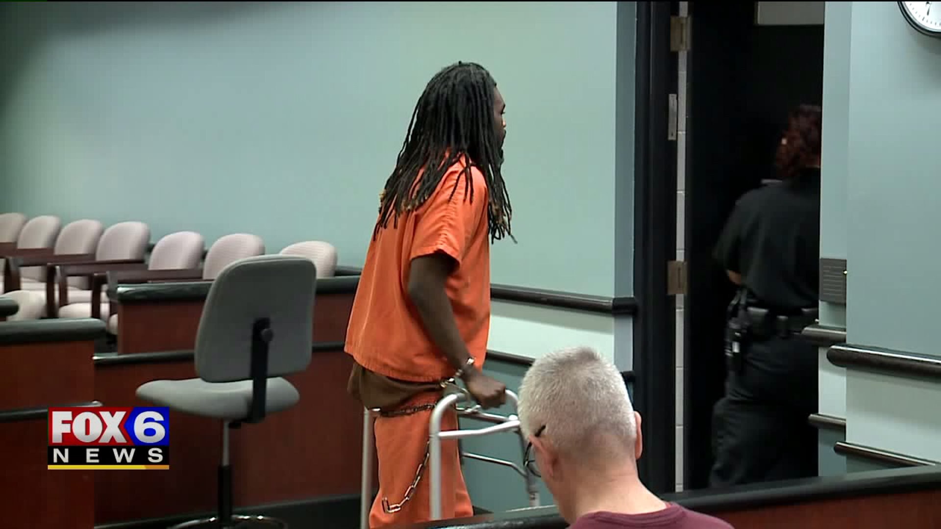 Police chase suspect in court