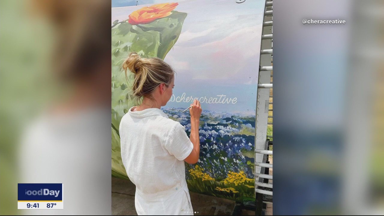 Dallas artists paints murals on massive wind turbines