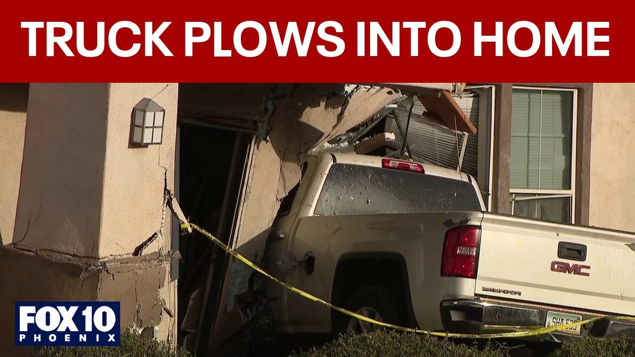 Neighbor reacts after truck crashes into Phoenix home