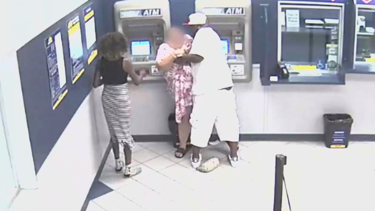 Man robs woman at ATM