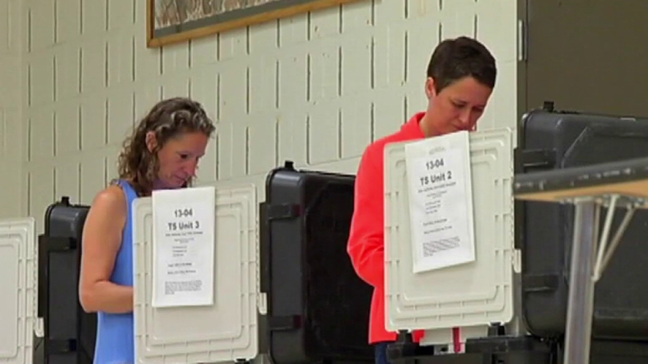 Early voting soars in swing states