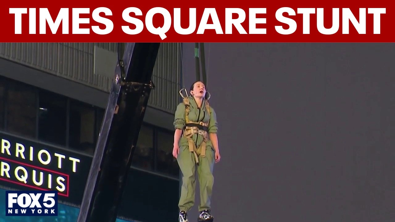 Artist's death-defying stunt in Times Square