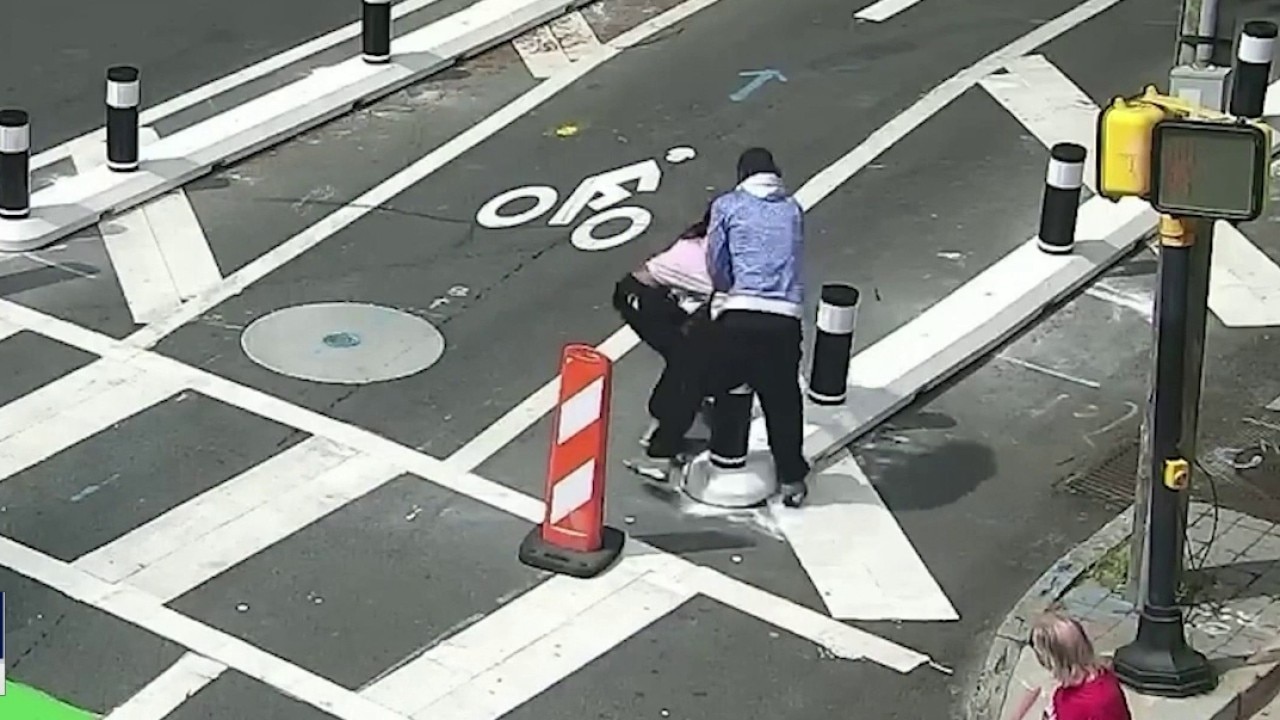 Midtown video shows man punch woman on stree
