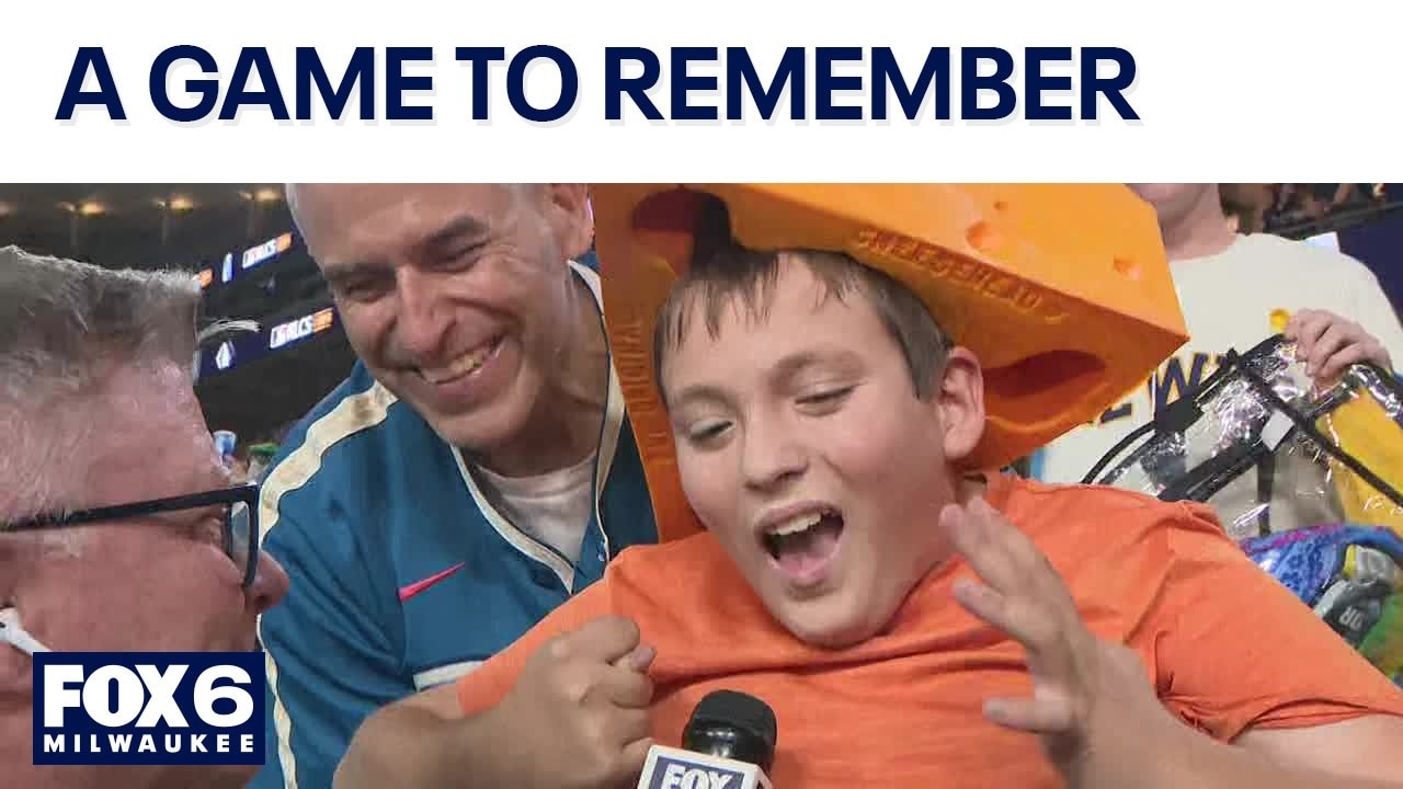 Young Brewers fan celebrates win at Dodger Stadium