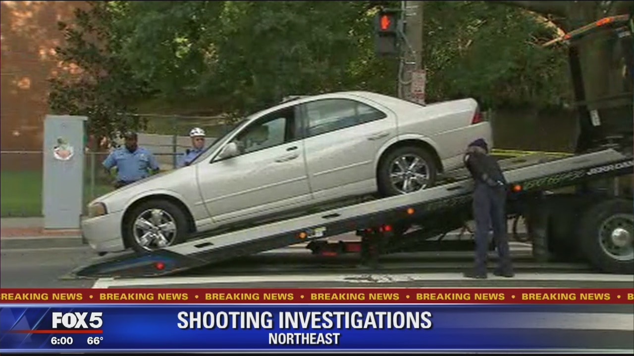 Man inside car shot outside of DC school