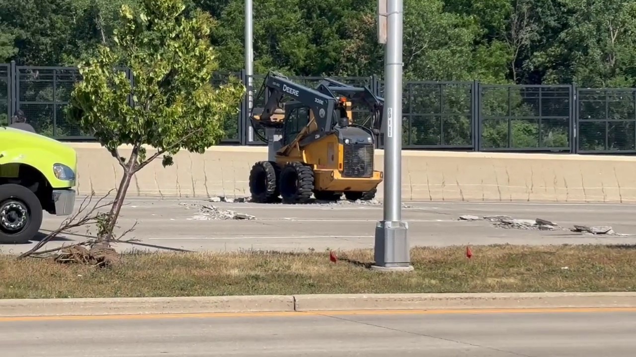 Pavement damage near Bluemound and State Highway 100 (Mayfair Rd)