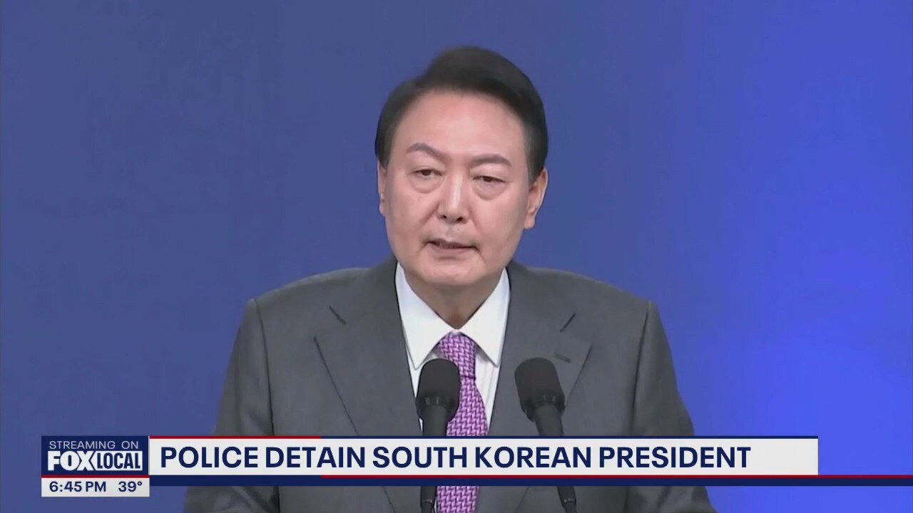 Police detain South Korean president