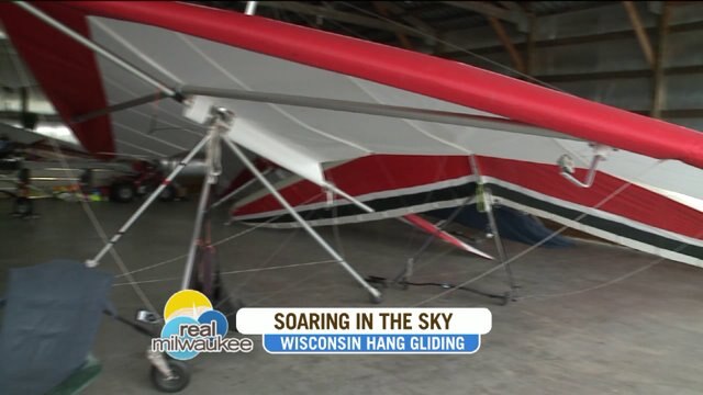 Chip learns about safety precautions of hang gliding