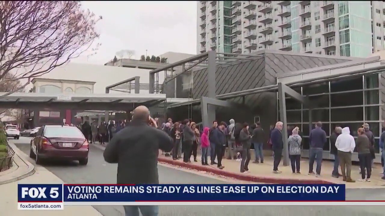 Voting remains steady as lines to vote in runoff east