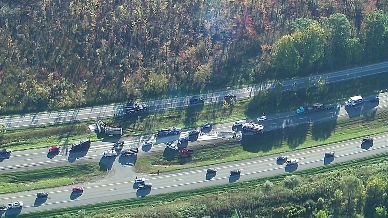 Massive backup on US-23 due to gravel hauler rollover
