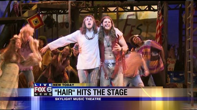 Laura enjoys an energetic performance of "Hair"
