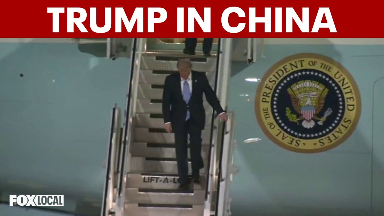 Trump arrives in China for high-stakes meeting with Xi