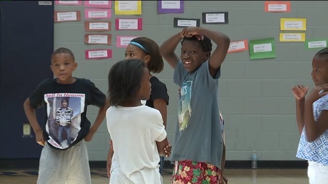 Family and friends come together to honor young man shot, killed one year ago