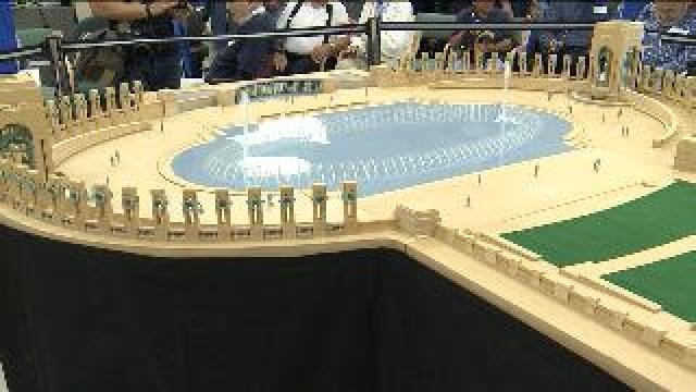 World War II veterans view mini memorial