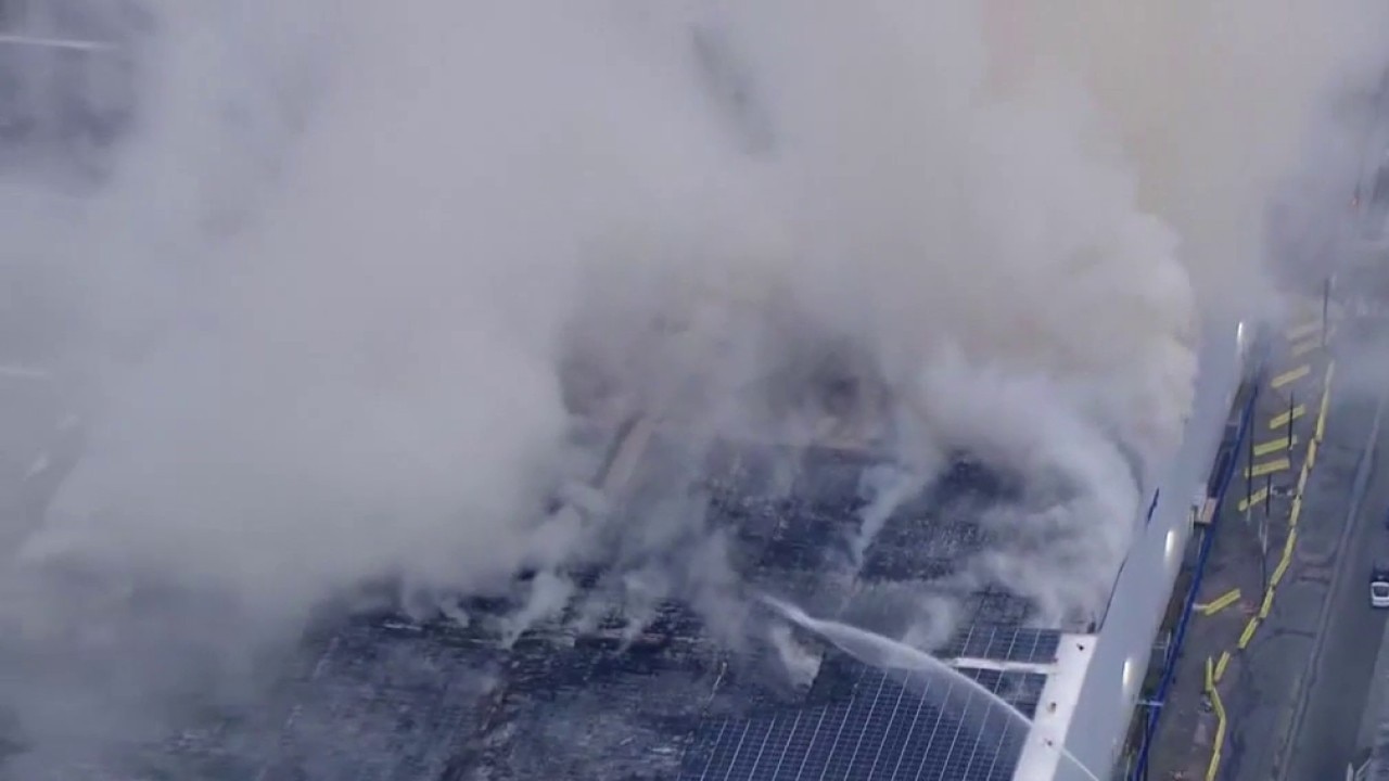 Boyle Heights warehouse fire continues to burn