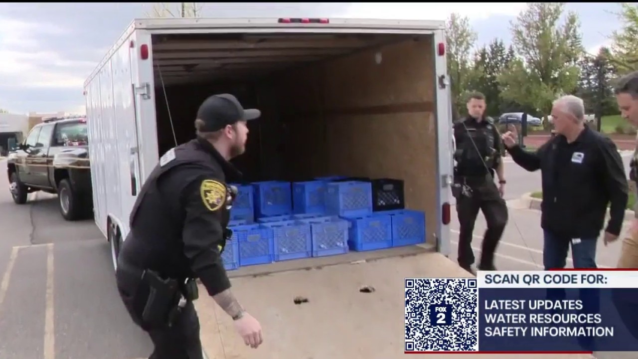 Officials and Oakland County businesses are giving out water to help residents