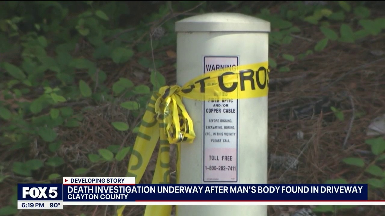 Investigation ongoing after man found dead in driveway