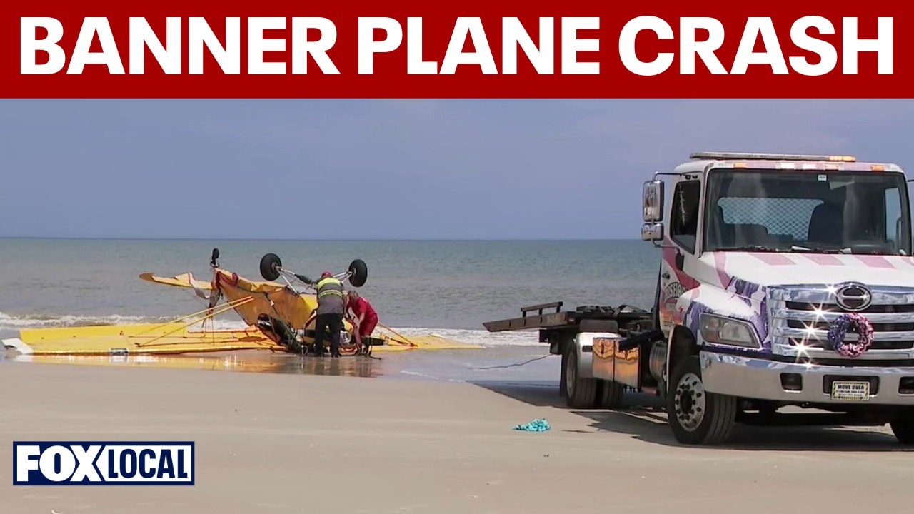 Banner plane crash lands on Smyrna Beach in Florida