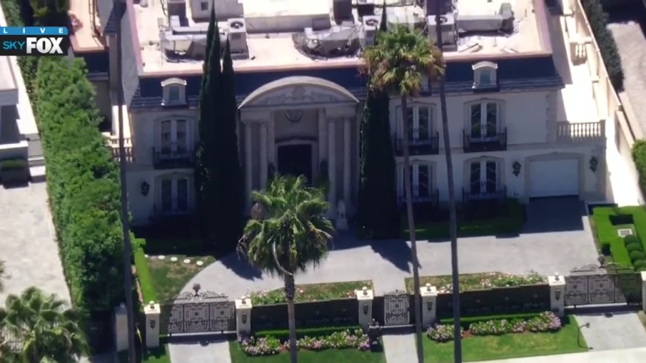 FBI serving search warrant at Beverly Hills home