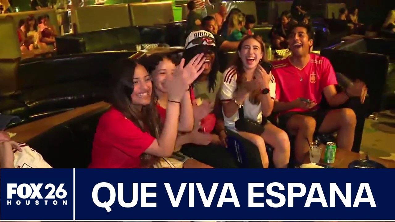 Spain fans celebrate victory over Belgium
