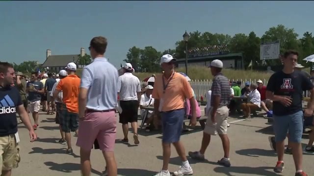 Fans try to beat the heat during day two of PGA Championship