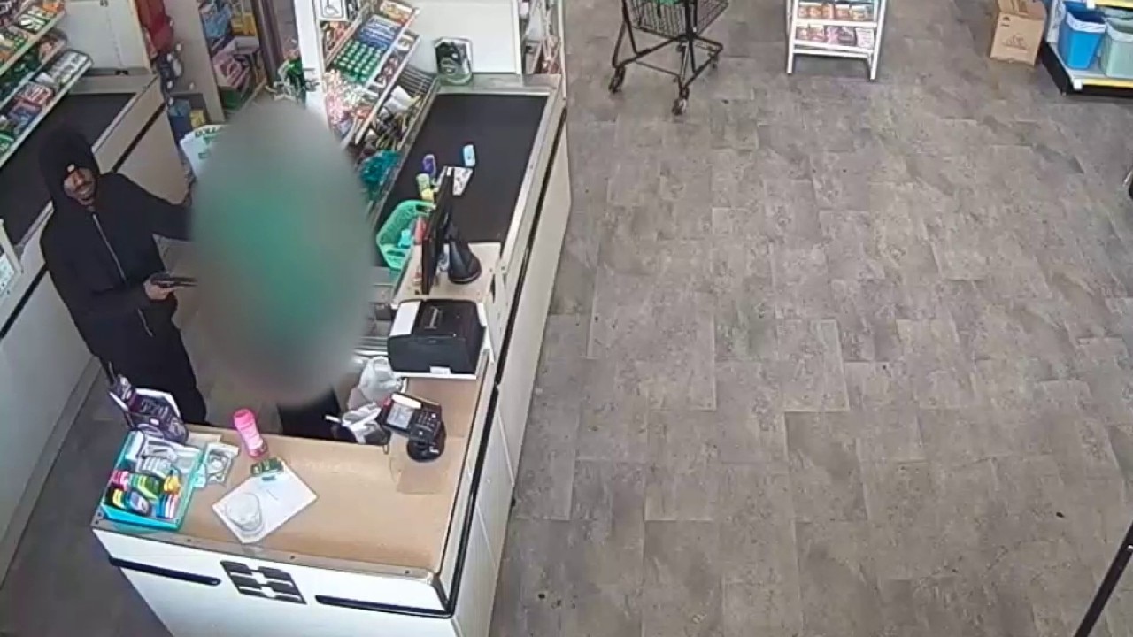 Armed suspect takes $800 cash from local register