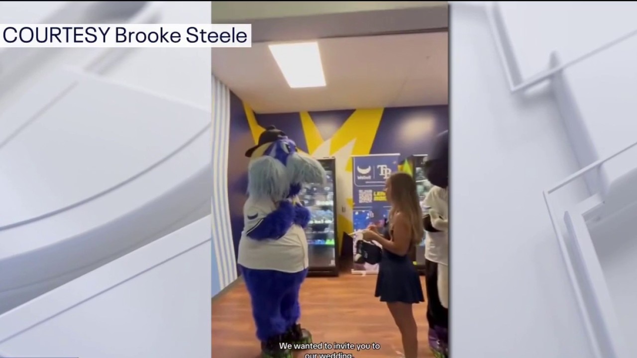 Rays-themed wedding invite given to Raymond
