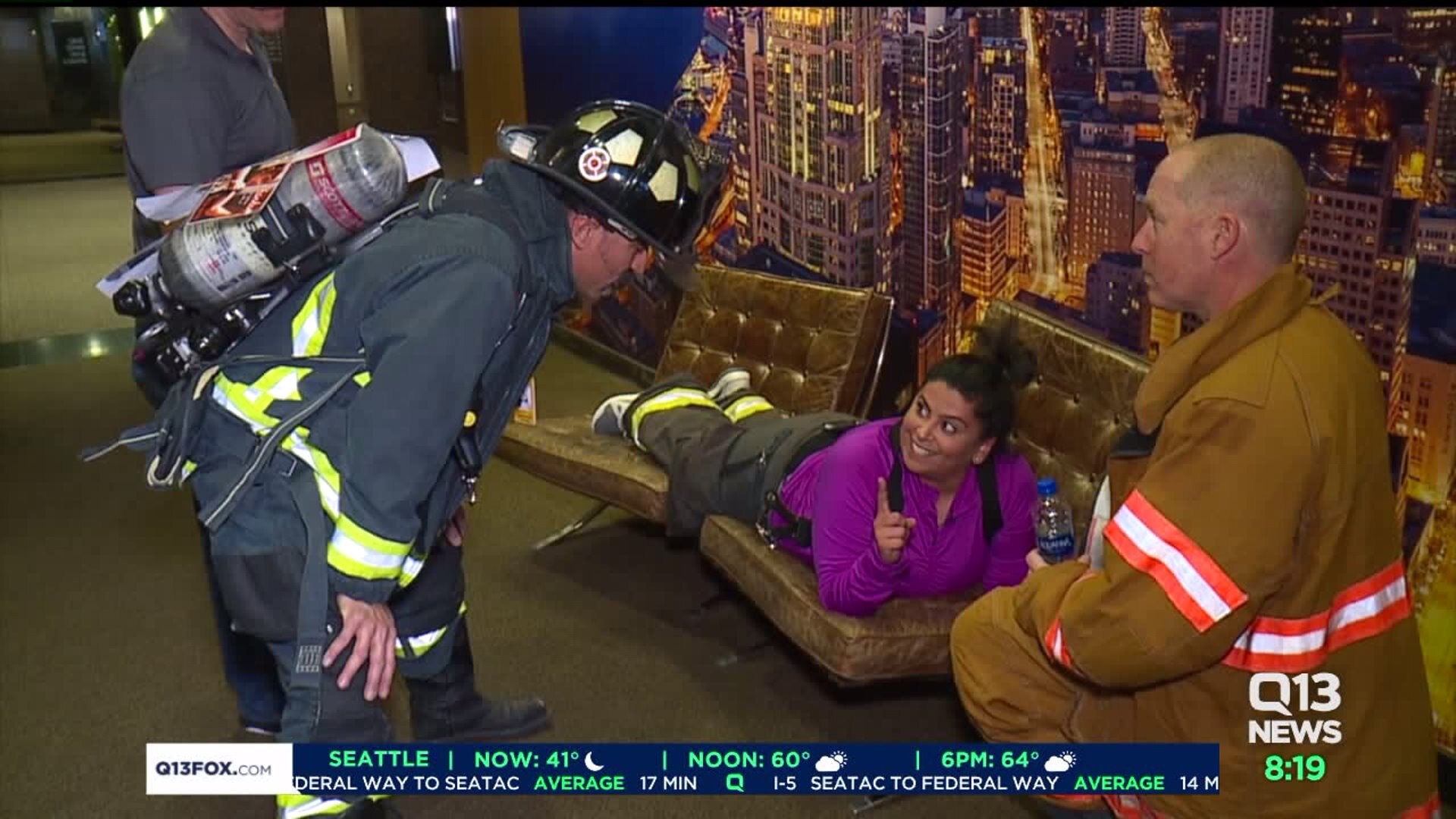 Ellen Tailor walks to the top of the Columbia Tower