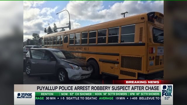 Robbery suspect leads police on chase through Puyallup, eventually hitting empty school bus