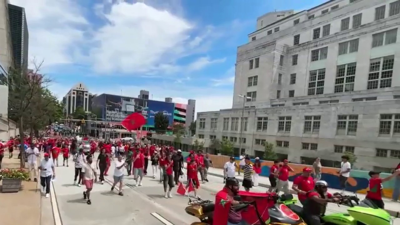 Morocco fans march to Atlanta Stadium before match