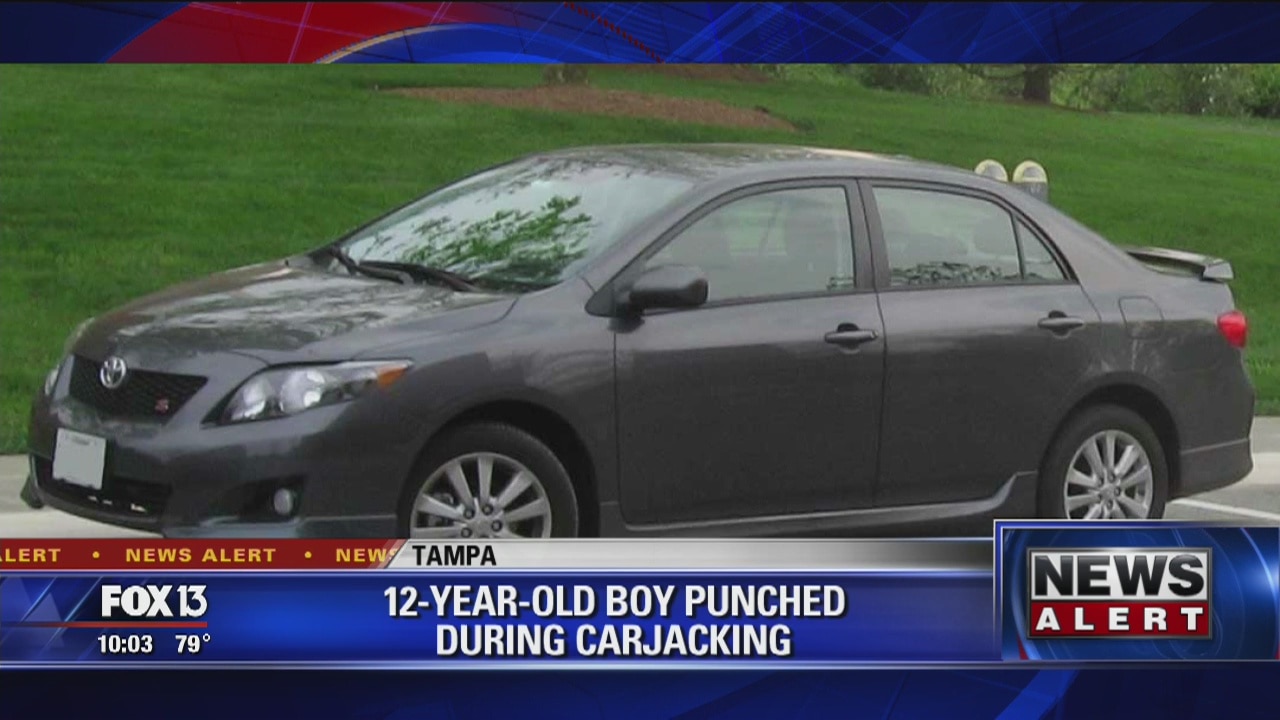 Suspect punches 12-year-old before stealing car