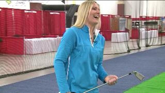Laura has a blast golfing