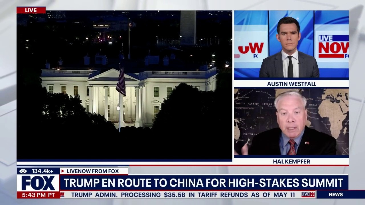 Trump en route to China for high-stakes summit