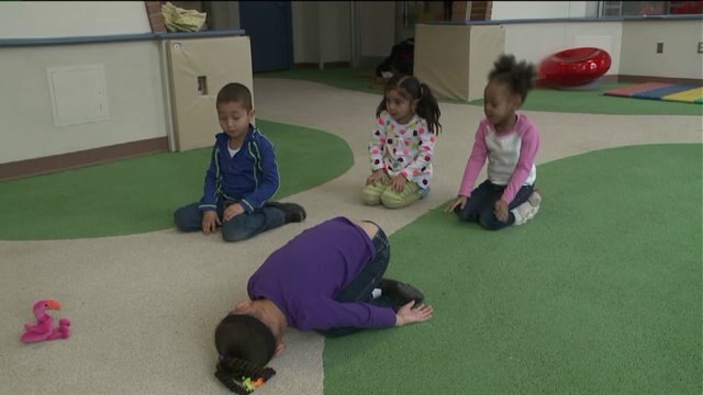 Chip talks kids yoga at Penfield Children`s Center