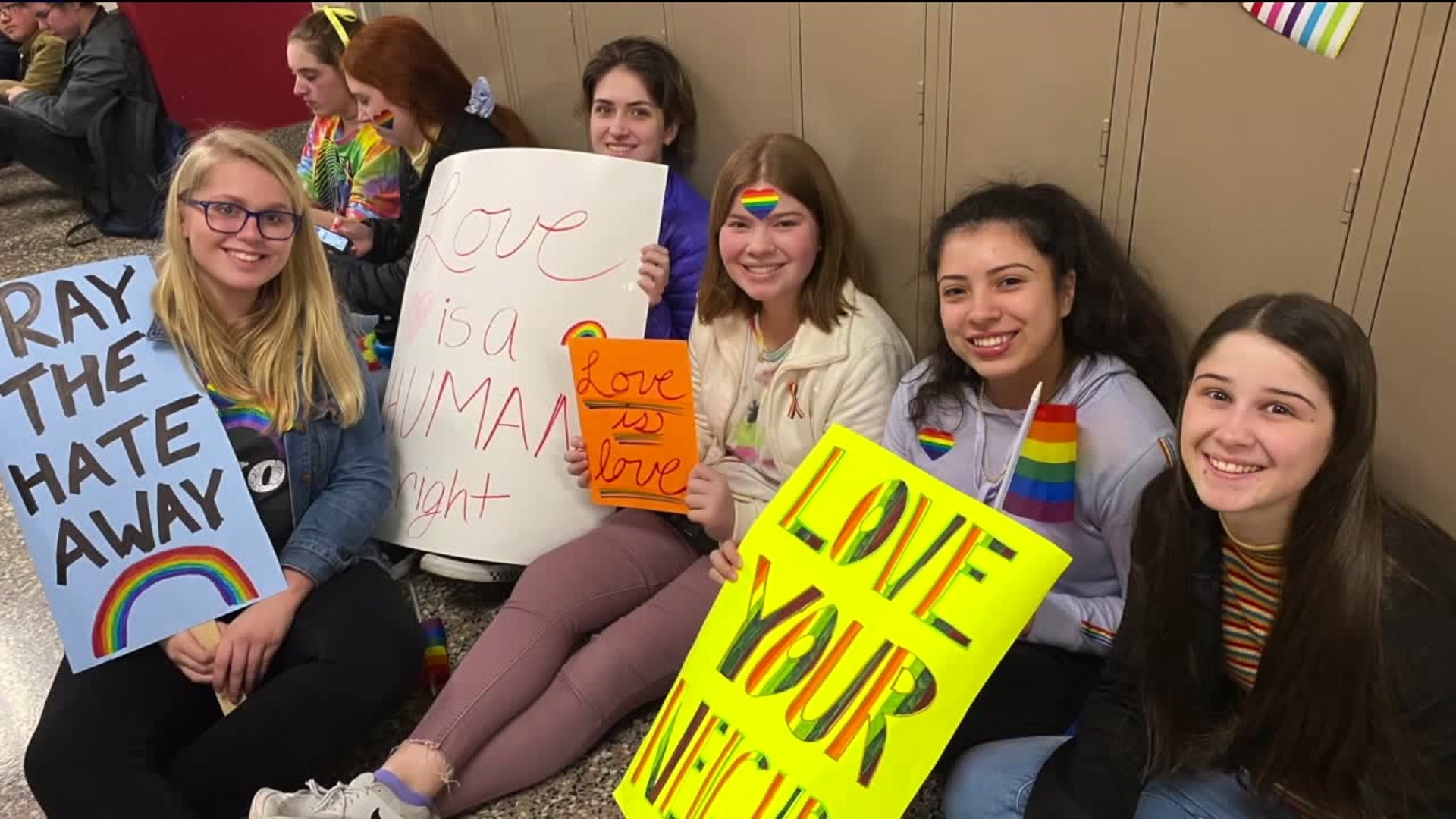 Crowd rallies outside Catholic high school in Burien after gay teachers resign