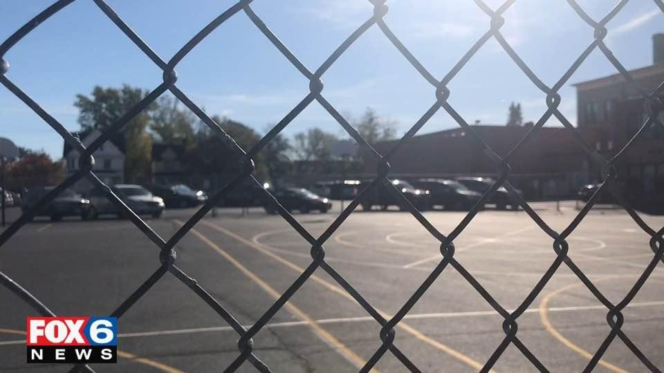 Racine principal arrest