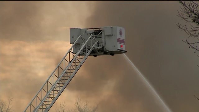 Exploding propane tanks ignite large fire at business on Milwaukee`s south side