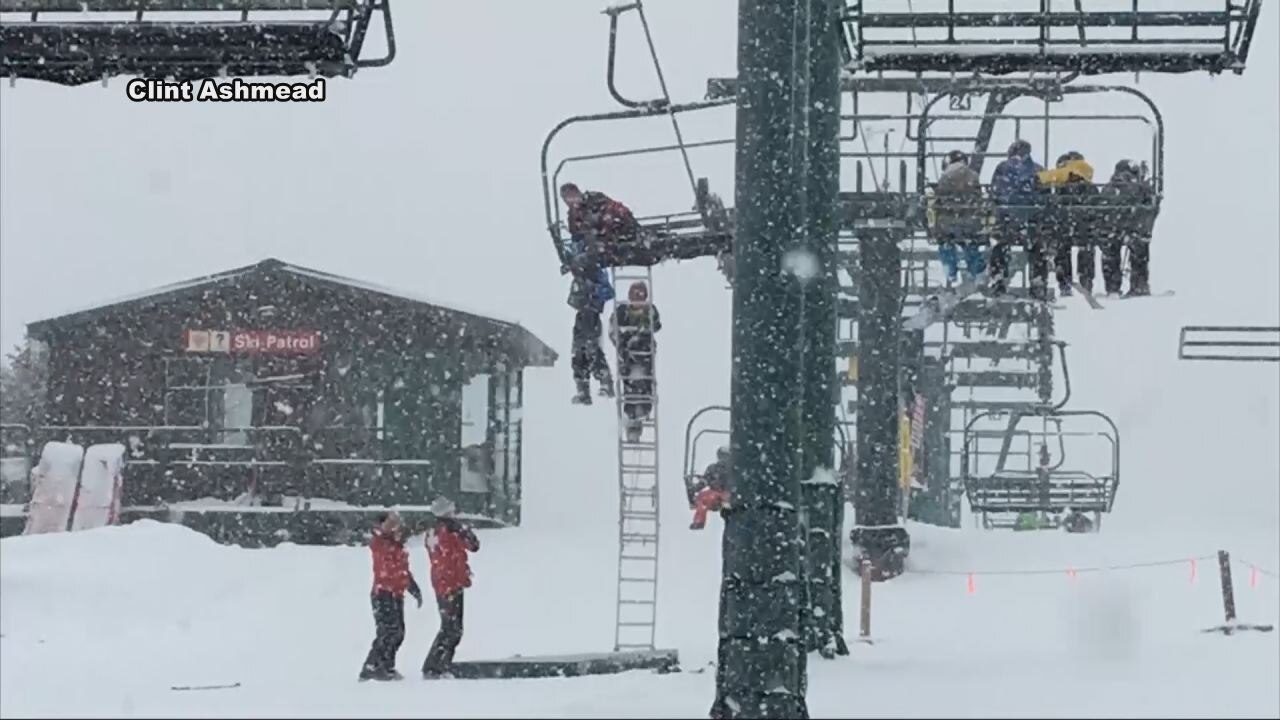 Boy rescued after hanging from ski lift