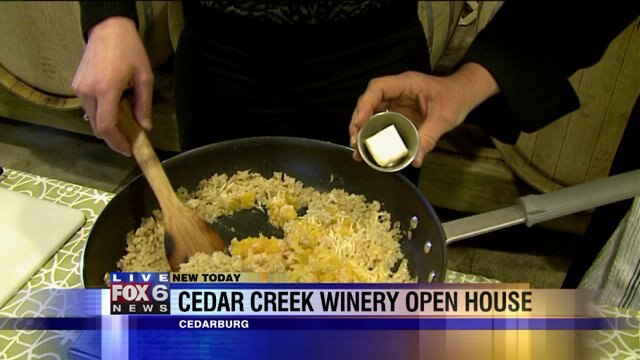 Laura helps prepare butternut squash risotto with wine