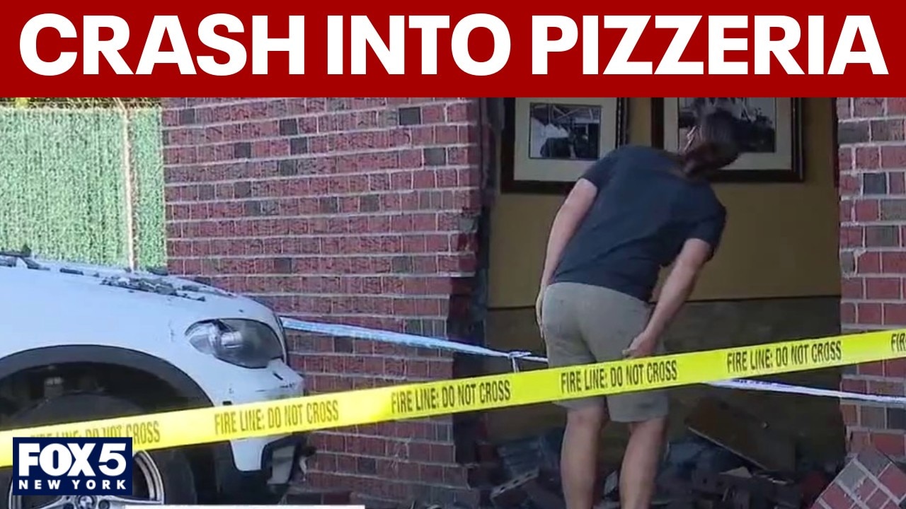 2 people hurt after SUV crashes into Queens pizzeria 