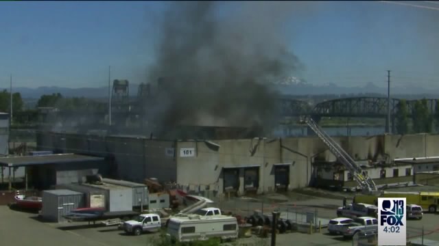 Fire At Recycling Center Continues To Burn