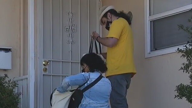 Local non-profit knocking on doors in South LA to get people vaccinated